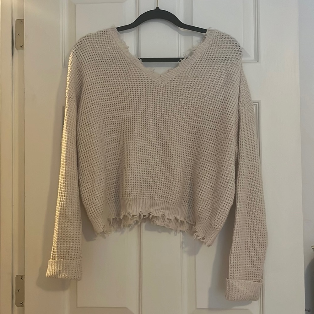 Raw hem sweater